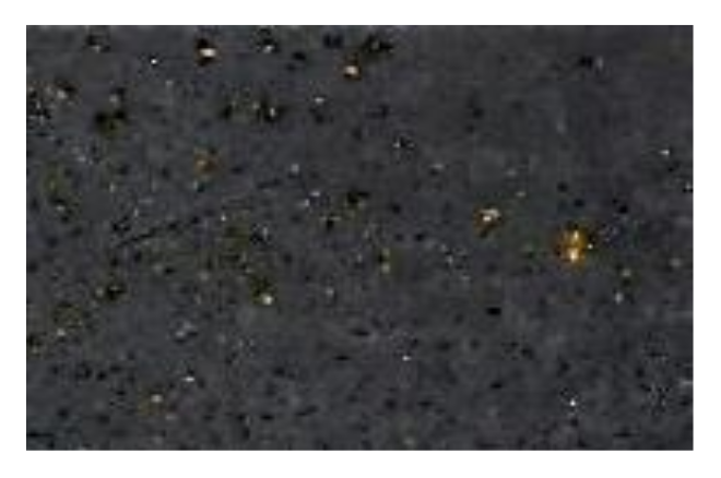 Fluxtrol | ASM HTS 2019 Improving Corrosion Resistance of Soft Magnetic Composites for Induction Heat Treating Applications Figure 4 - Close up of corrosion on Fluxtrol 100 sample having additional surface treatment coated with B material. after 168 hours of humidity testing.