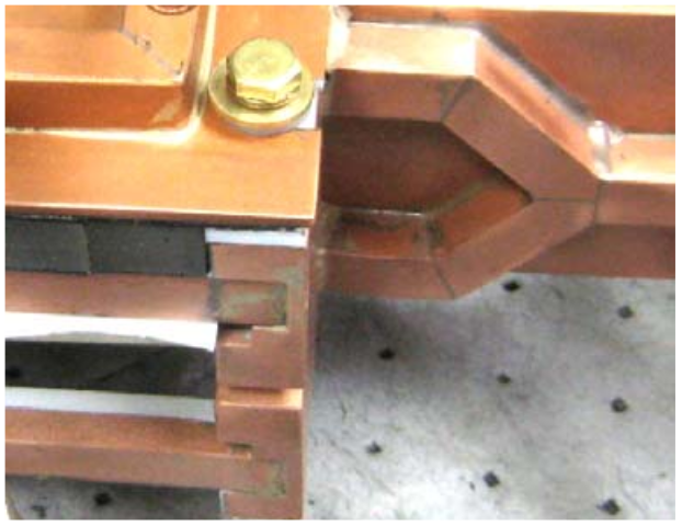 Fluxtrol - Modified Solenoid Coil That Efficiently Produces High Amplitude AC Magnetic Fields with Enhanced Uniformity for Biomedical Applications - Figure 7 Photograph of inductor corner 